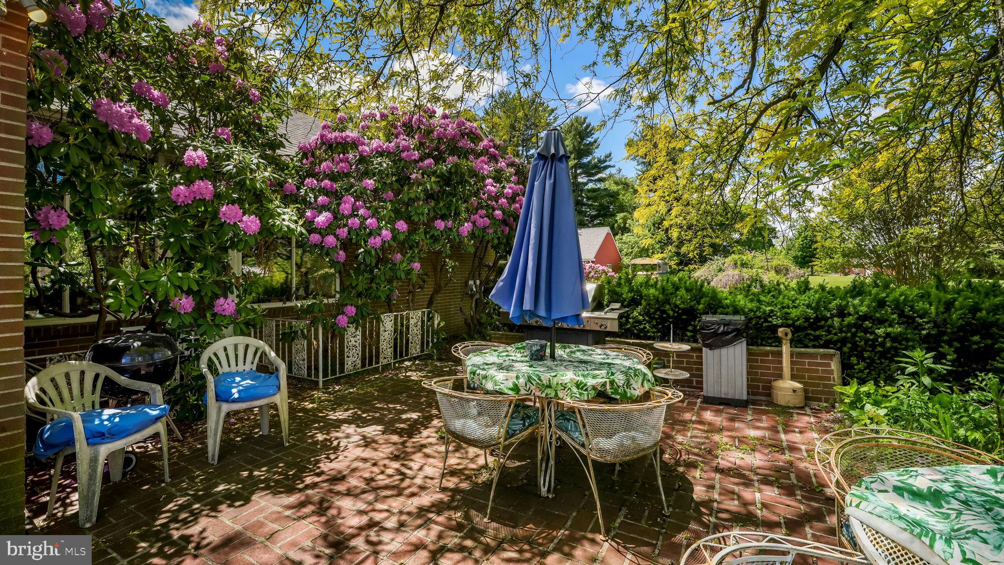 1591 Middletown Road Glen Mills, PA 19342 - Photo 28 of 55 a patio with table and chairs and potted plants