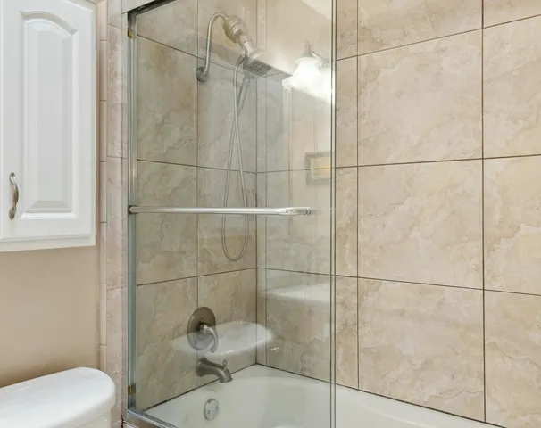 a bathroom with a sink vanity and mirror