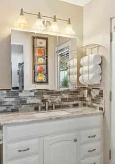 a bathroom with a shower and a toilet