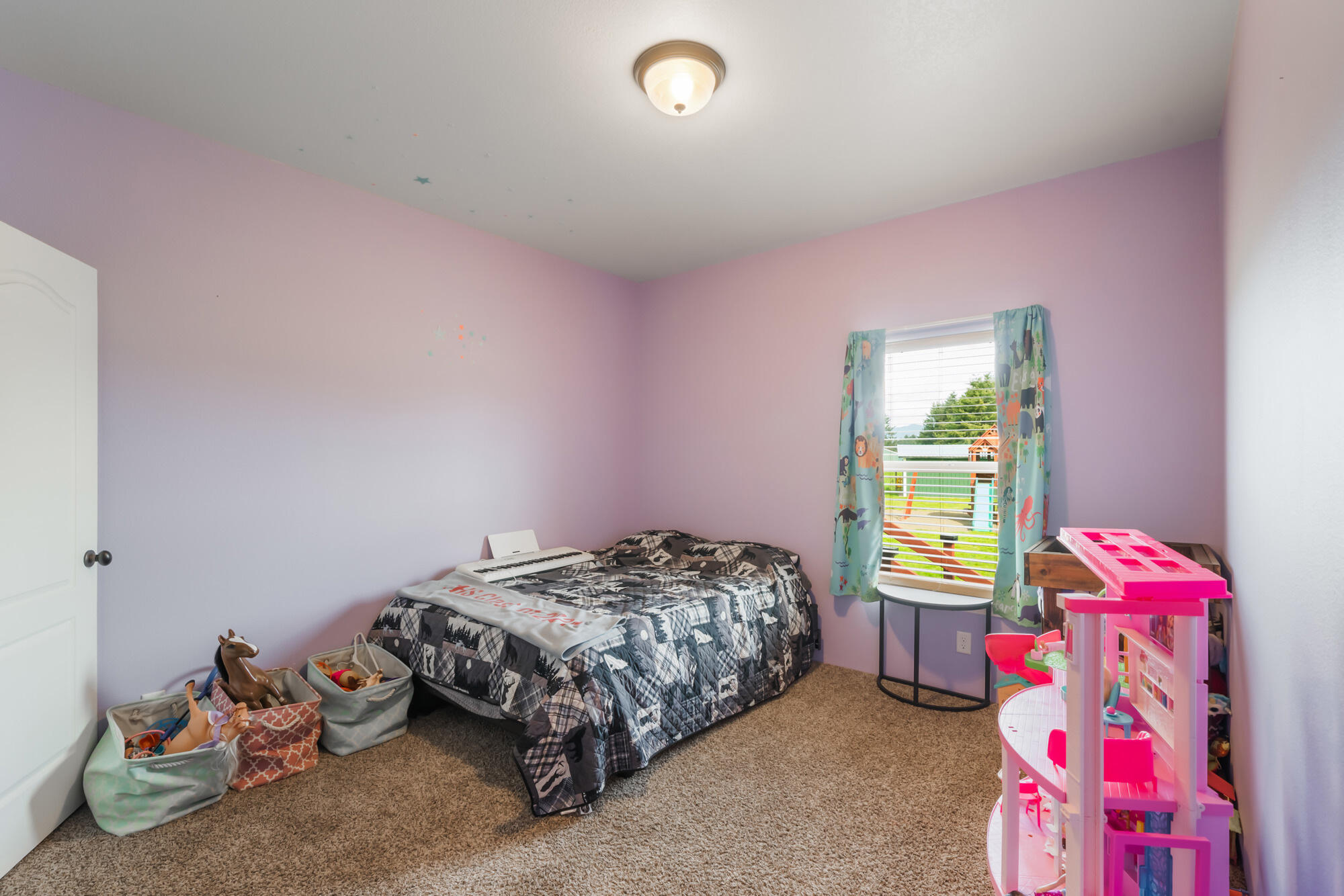 7400 South Prairie Road Tillamook, OR 97141 - Photo 53 of 62 a bedroom with a bed and a window