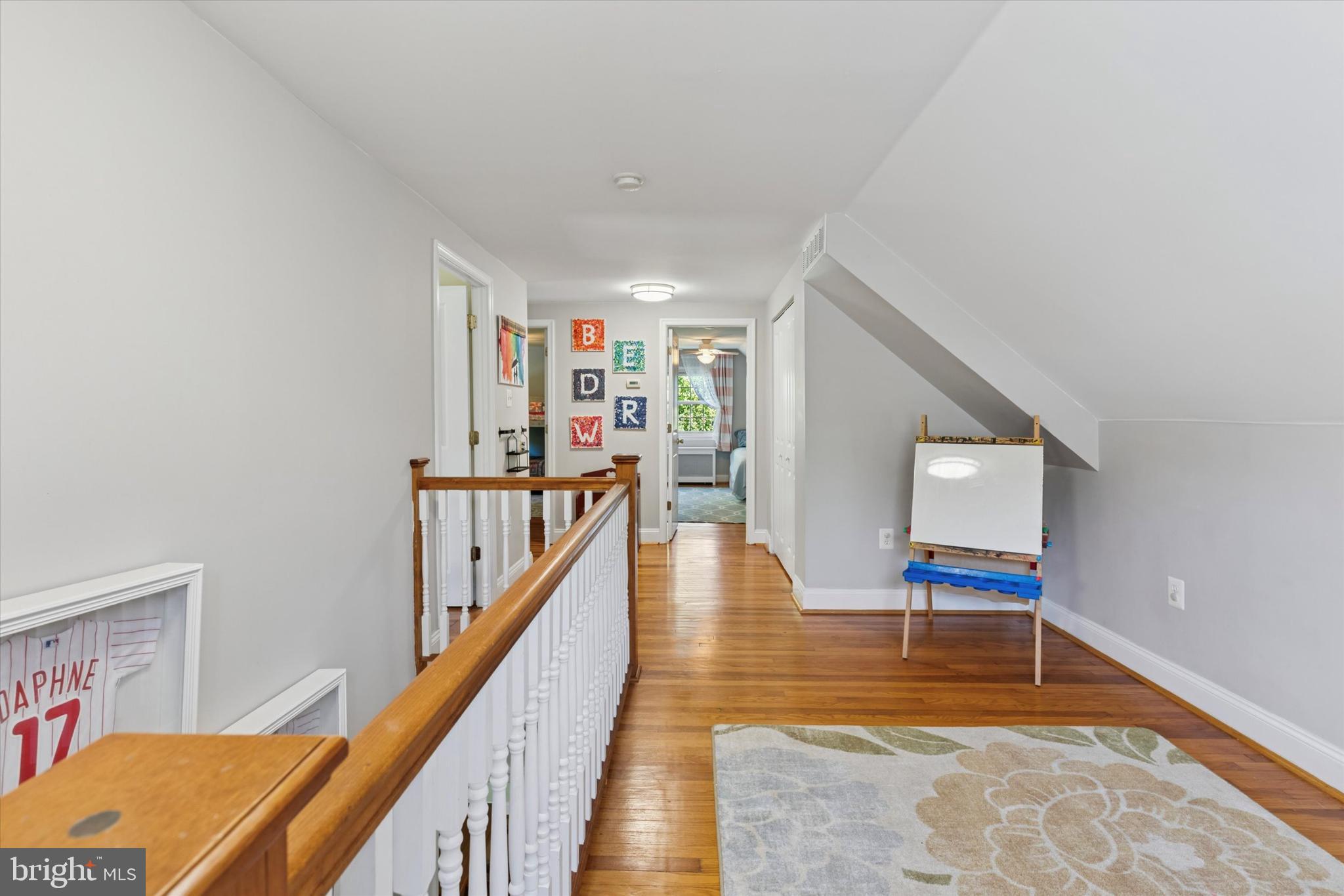 510 Concord Road Broomall, PA 19008 - Photo 16 of 35 a view of a hallway with wooden floor and staircase