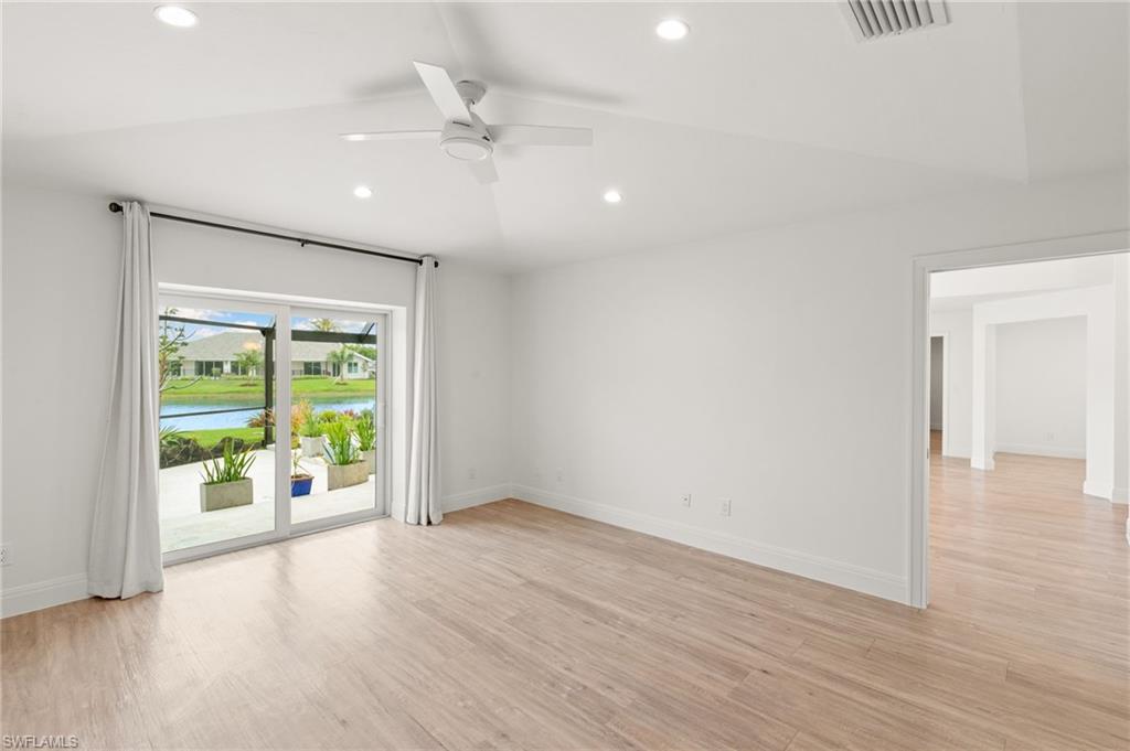 2178 Pinewoods Circle, Unit 25 Naples, FL 34105 - Photo 21 of 45 a view of an empty room with a window