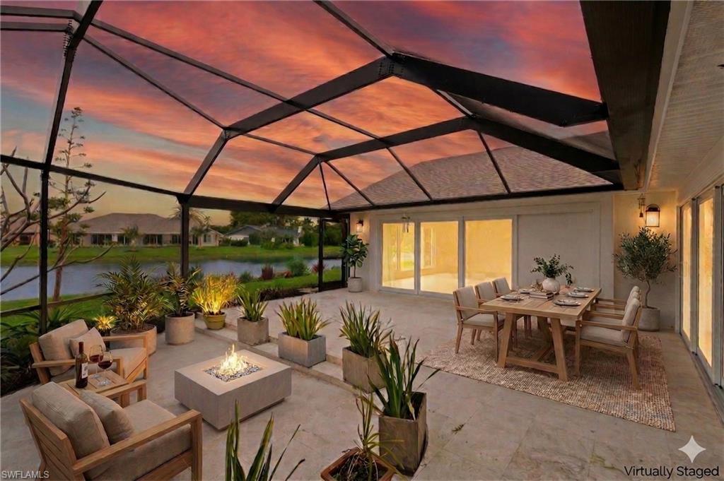 2178 Pinewoods Circle, Unit 25 Naples, FL 34105 - Photo 33 of 45 a view of an outdoor space with furniture and table in patio