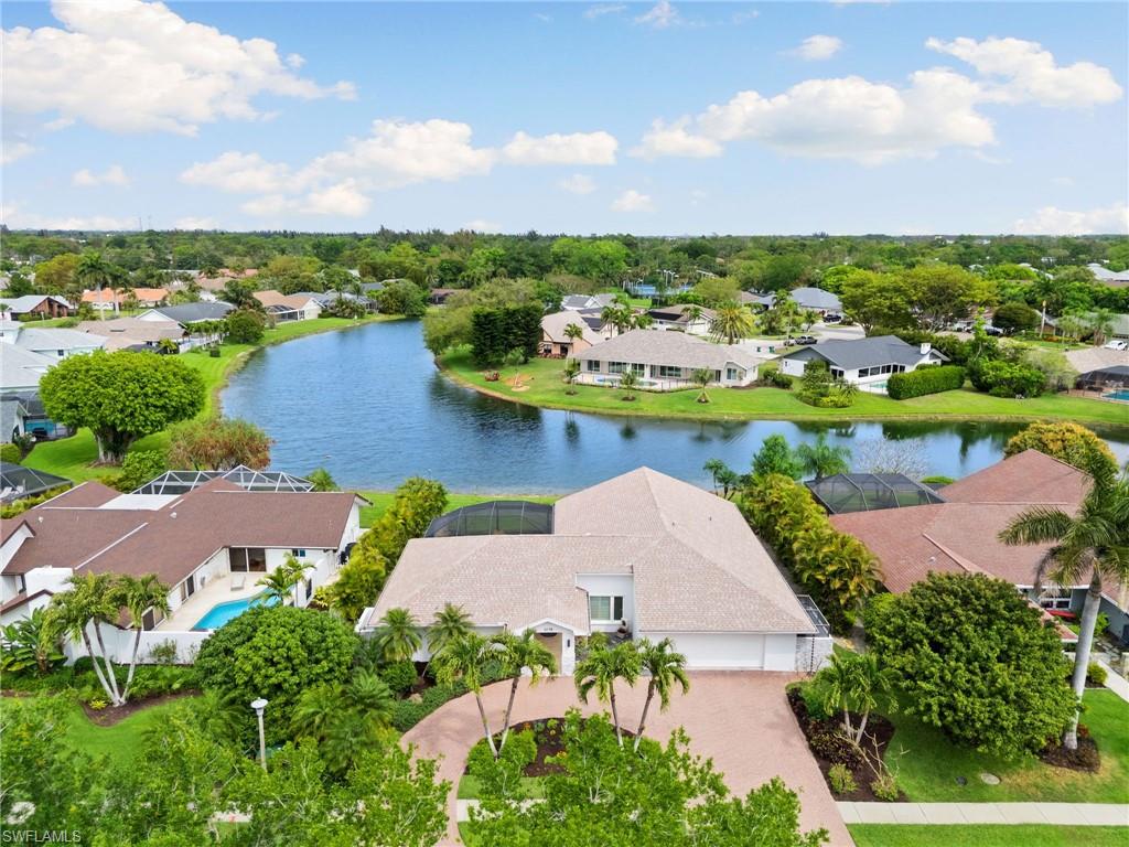 2178 Pinewoods Circle, Unit 25 Naples, FL 34105 - Photo 4 of 45 an aerial view of a city