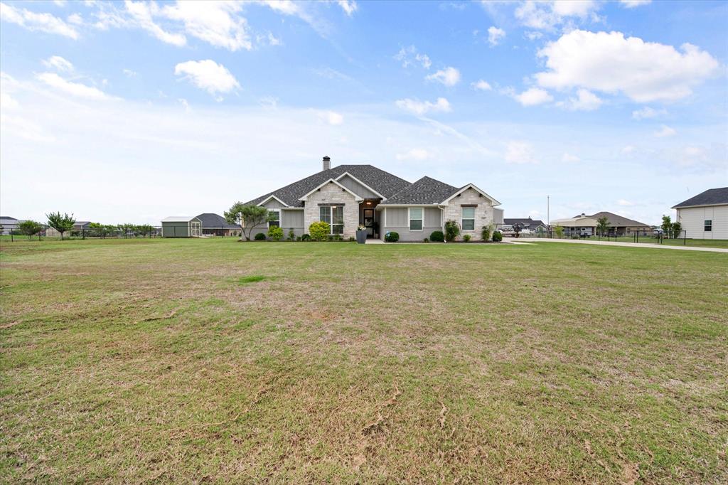 6365 Rhoden Avenue Godley, TX 76044 - Photo 30 of 31 a view of a lake with a big yard and large trees