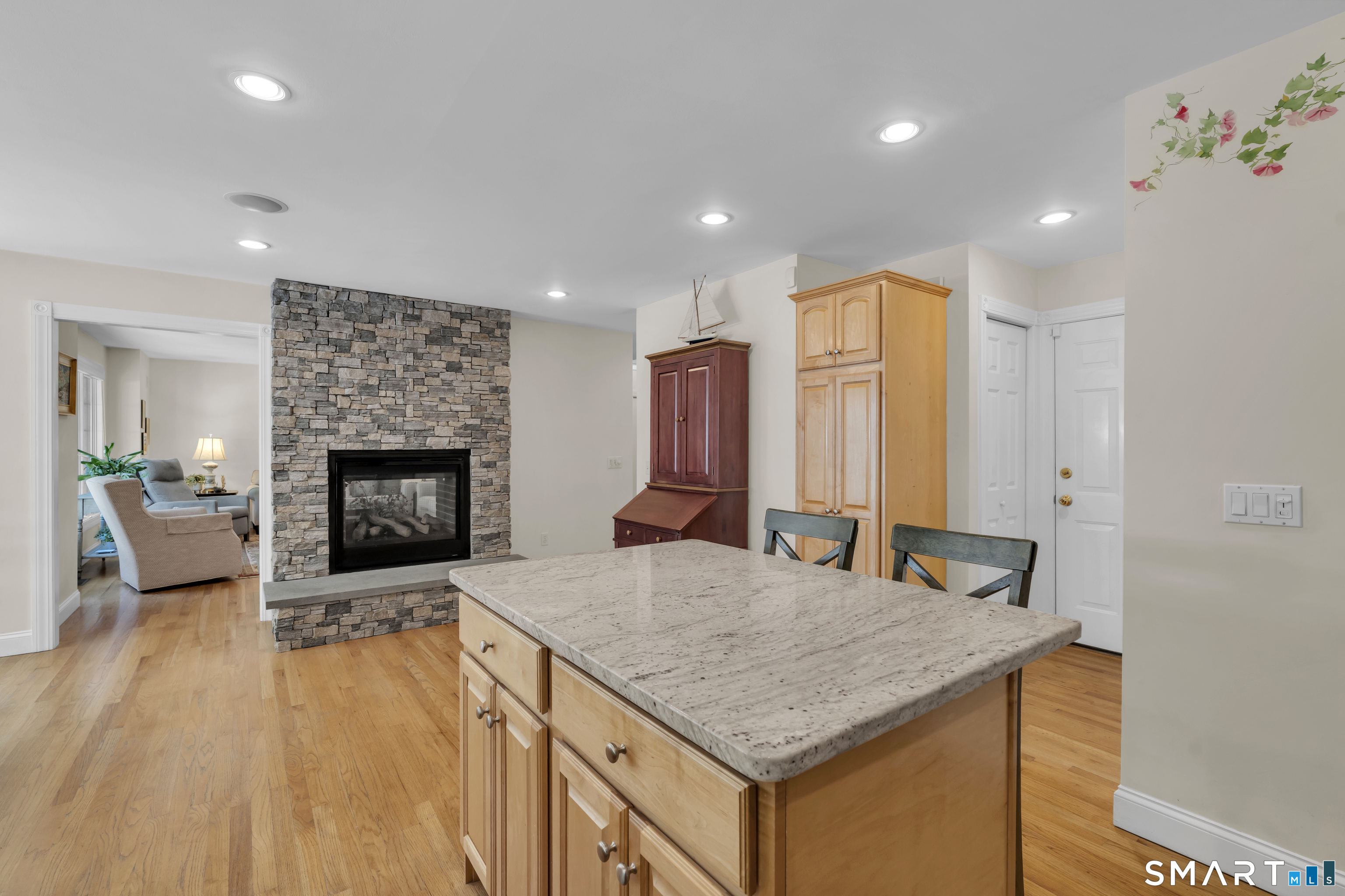 21 Stone Wall Road Salem, CT 06420 - Photo 18 of 38 a living room with furniture and a fireplace
