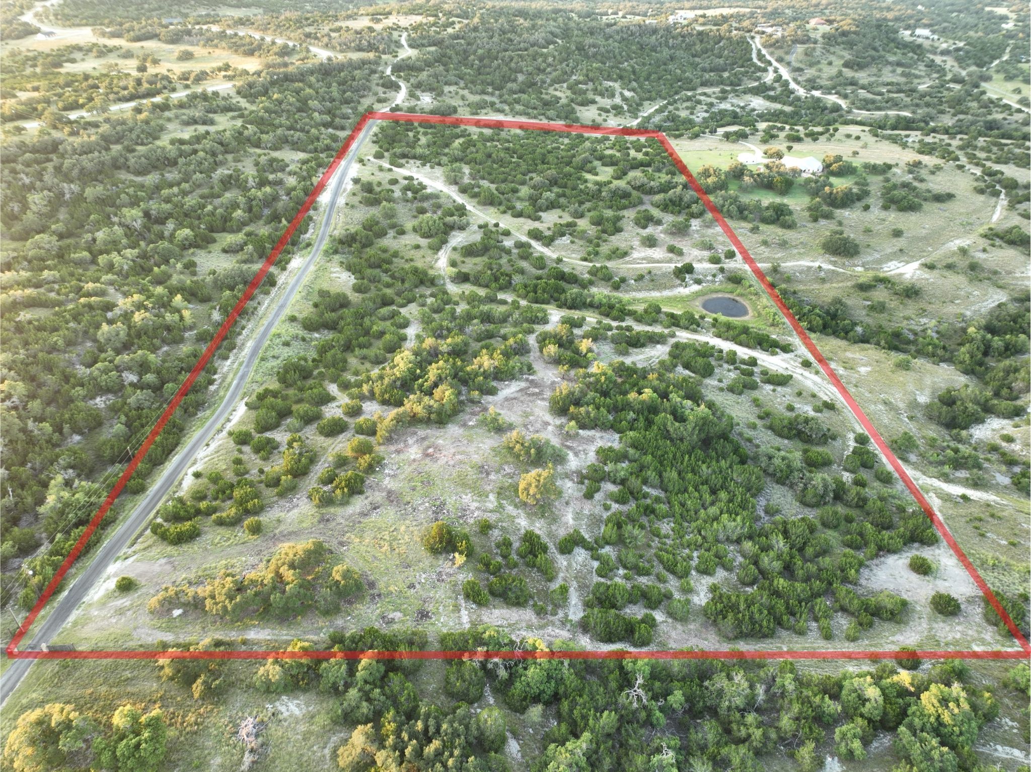 2 Sanctuary Lane Blanco, TX 78606 - Photo 1 of 12 a view of a yard