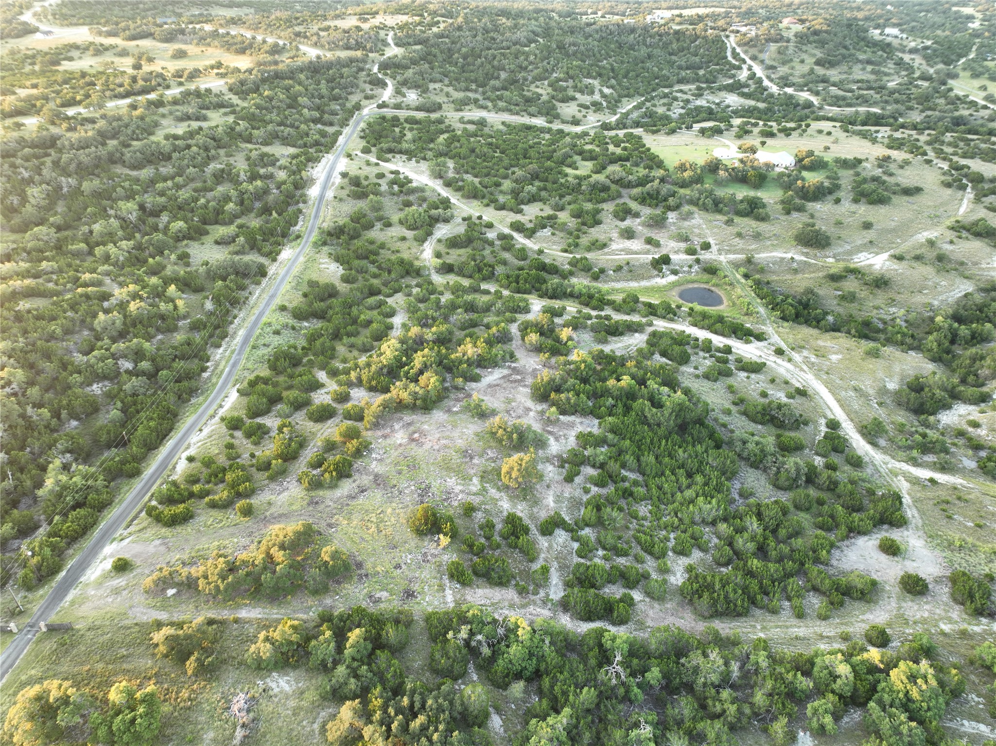 2 Sanctuary Lane Blanco, TX 78606 - Photo 2 of 12 a view of a yard