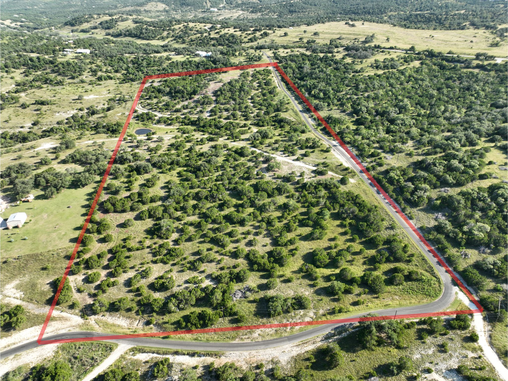 2 Sanctuary Lane Blanco, TX 78606 - Photo 3 of 12 a view of a garden