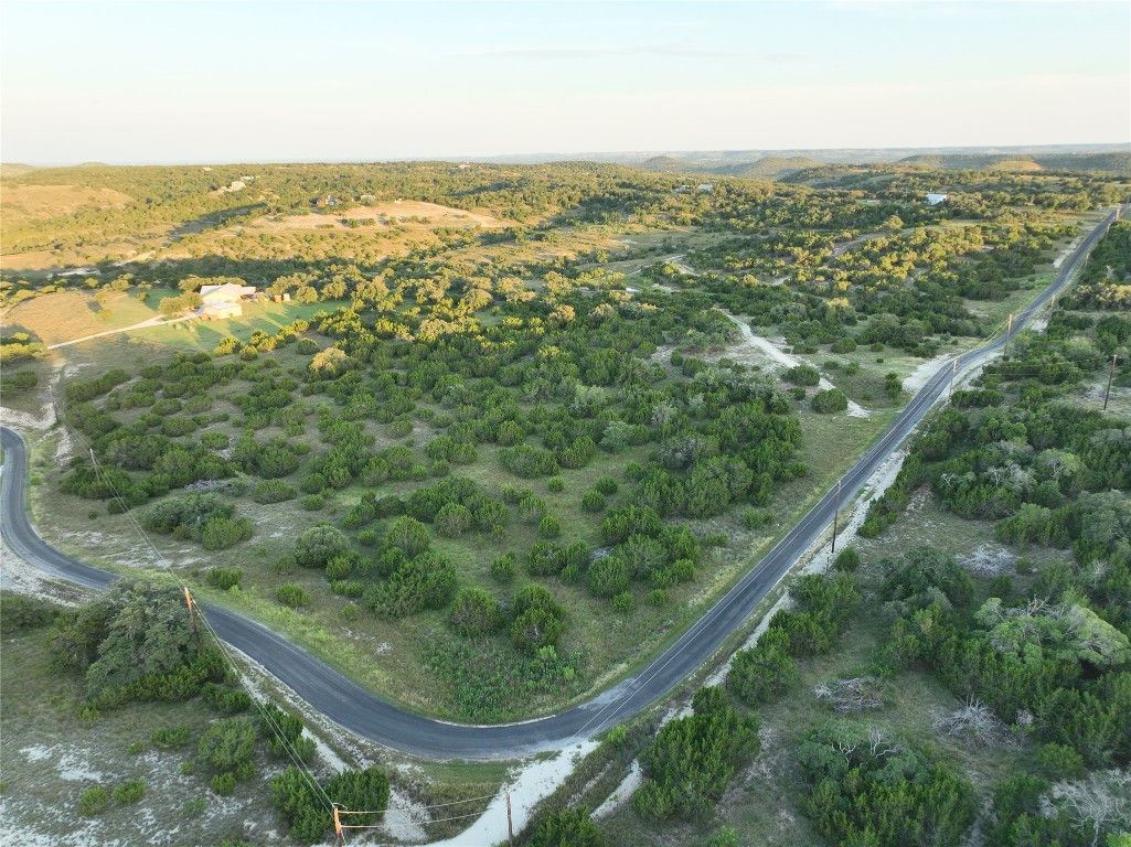 2 Sanctuary Lane Blanco, TX 78606 - Photo 4 of 12 an aerial view of residential houses with outdoor space and trees