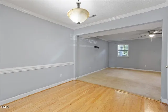 a view of empty room with windows