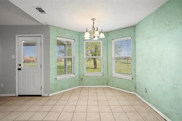 a view of an empty room with window