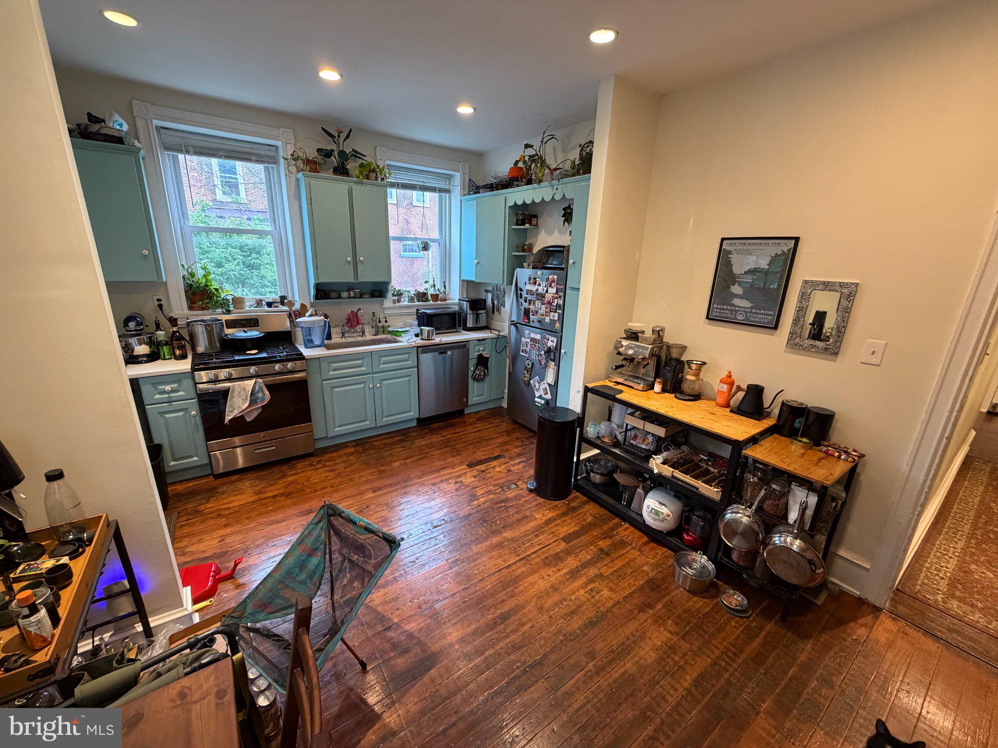 815 South 49th Street Philadelphia, PA 19143 - Photo 3 of 72 a living room with furniture and a wooden floor