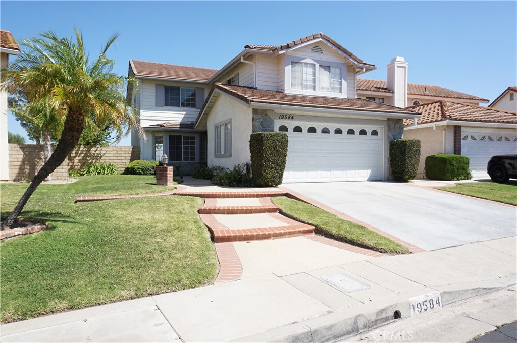 19584 Shadow Glen Circle Porter Ranch, CA 91326 - Photo 57 of 72 a house view with a outdoor space