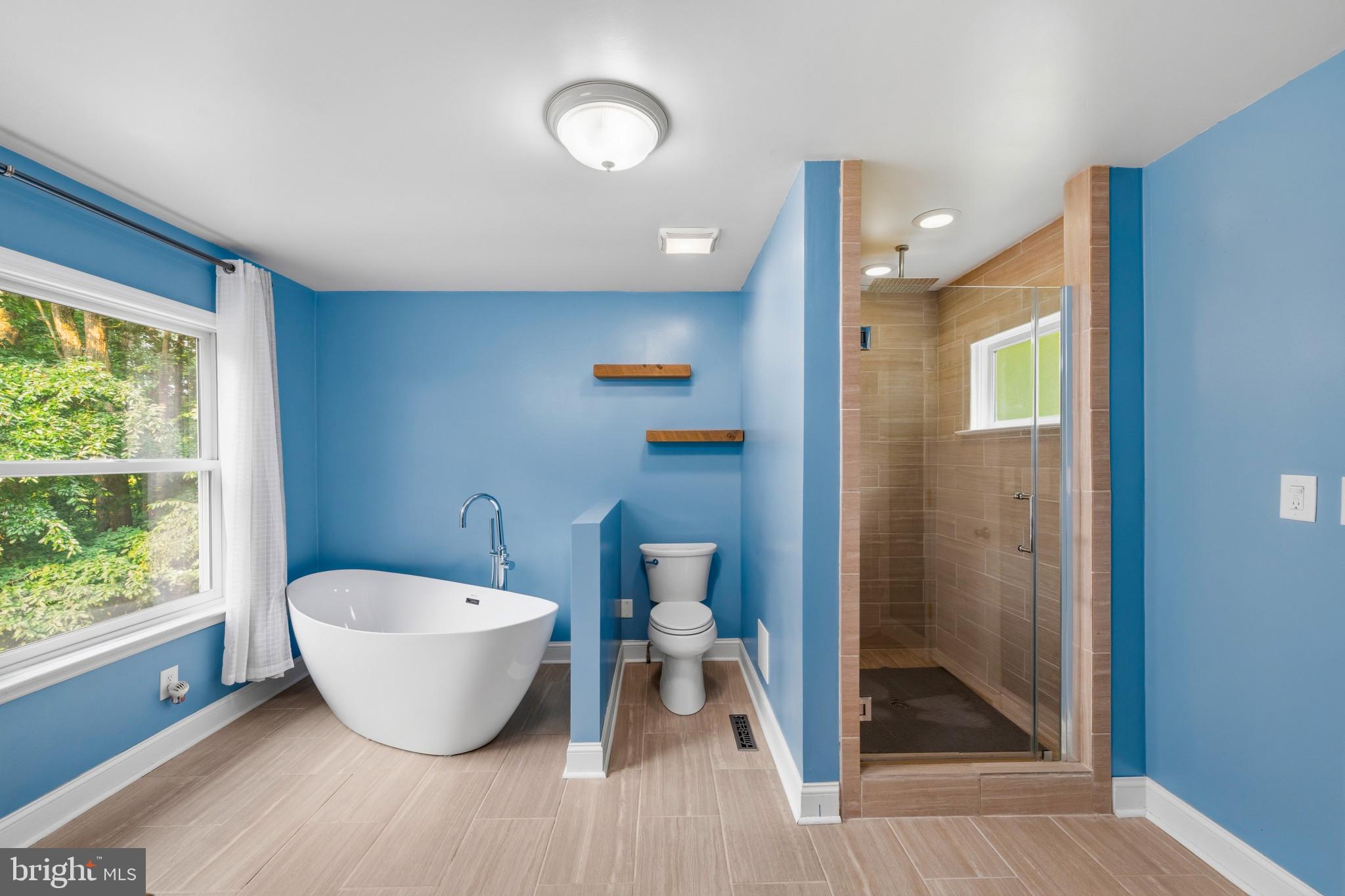 2702 Bird View Road Westminster, MD 21157 - Photo 26 of 41 a spacious bathroom with a toilet shower and a sink