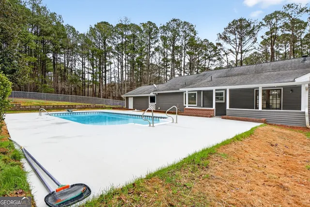 a view of a livingroom with wooden floor