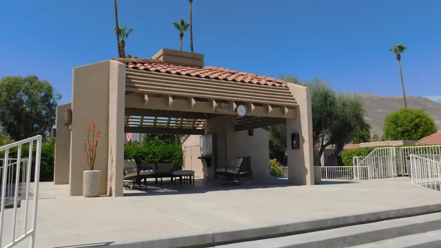 a view of a building with a porch