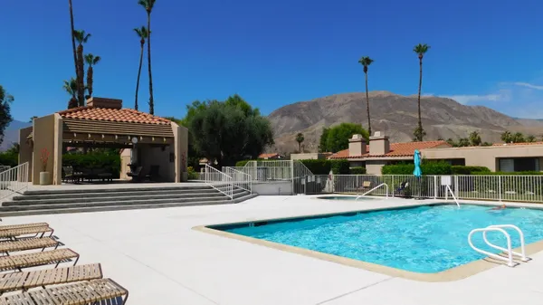a view of a building and front view of a house