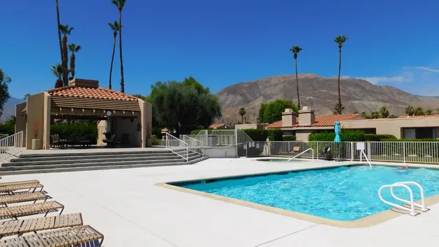 a view of a building and front view of a house