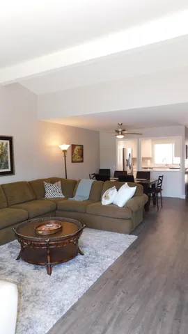 a living room with furniture and a table