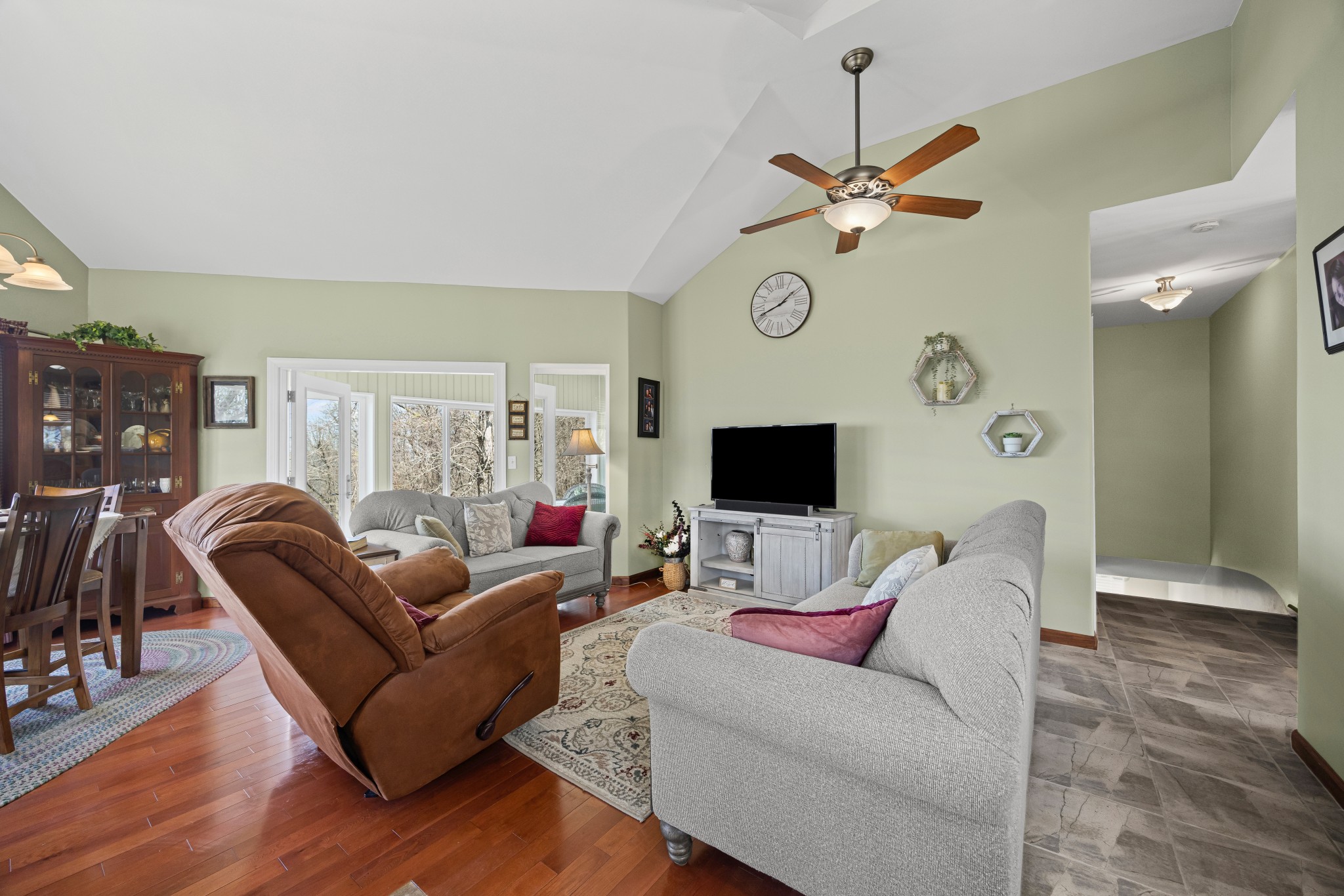 300 Iron Gap Road Belvidere, TN 37306 - Photo 15 of 84 a living room with furniture a ceiling fan and a rug