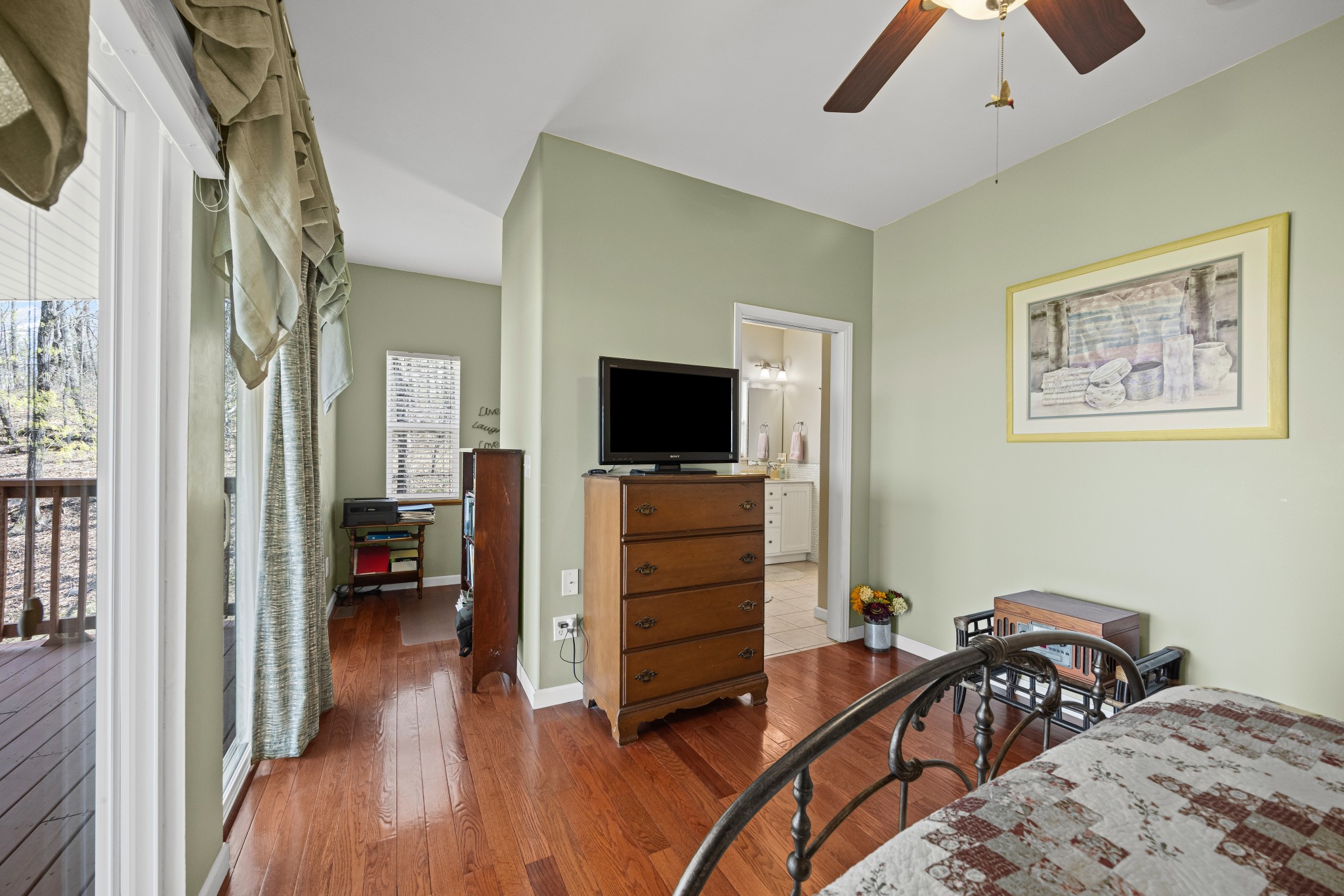 300 Iron Gap Road Belvidere, TN 37306 - Photo 22 of 84 a bedroom with furniture and flat tv screen