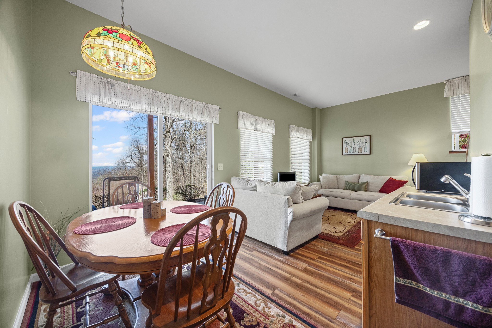 300 Iron Gap Road Belvidere, TN 37306 - Photo 36 of 84 a view of a dining room with furniture window and outside view
