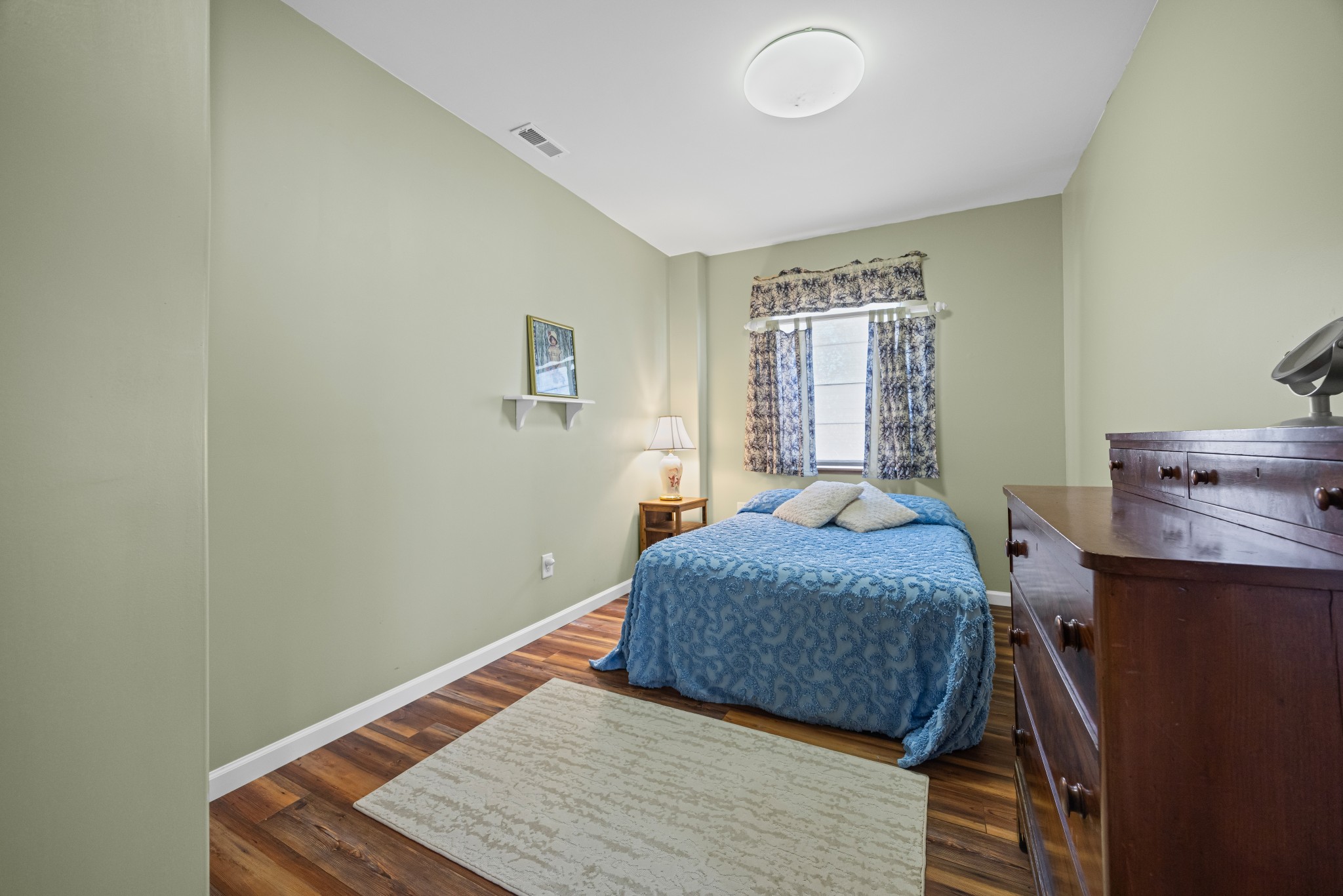 300 Iron Gap Road Belvidere, TN 37306 - Photo 39 of 84 a bedroom with a bed and wooden floor