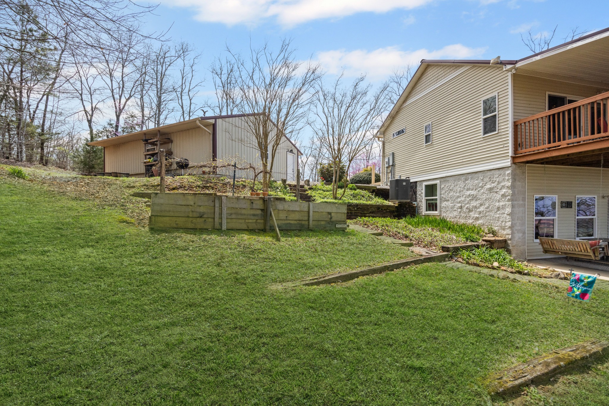 300 Iron Gap Road Belvidere, TN 37306 - Photo 50 of 84 a view of a house with a yard and sitting area