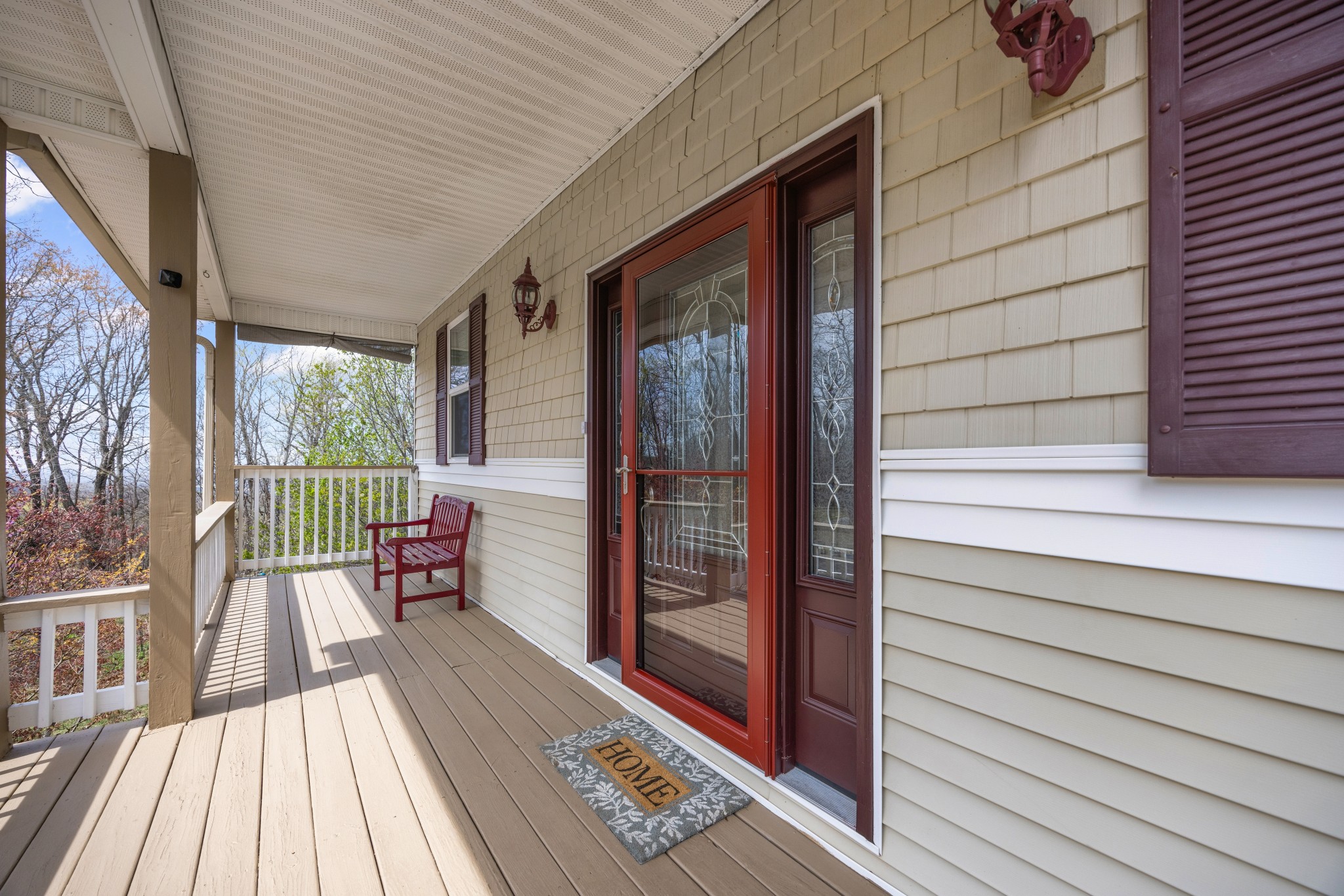 300 Iron Gap Road Belvidere, TN 37306 - Photo 8 of 84 a view of a two chairs with wooden floor and floor to ceiling window