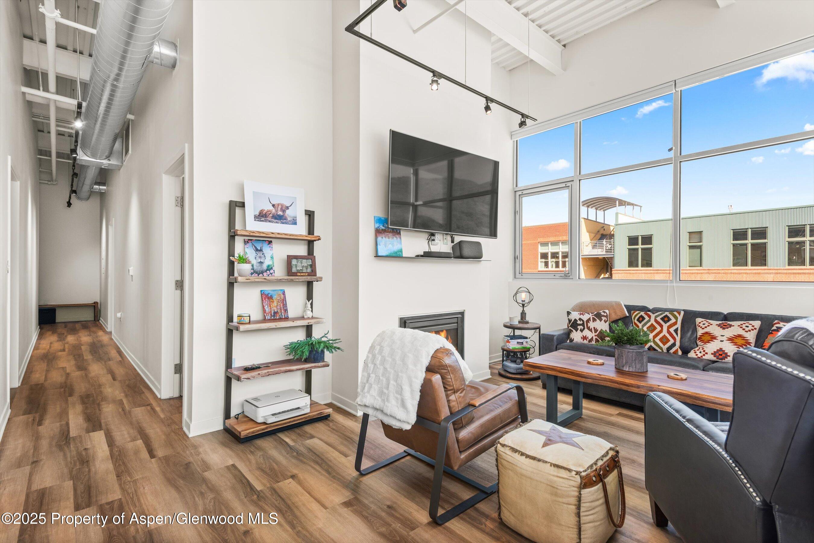 361 Robinson Street, Unit 314 Basalt, CO 81621 - Photo 4 of 17 a view of a livingroom with furniture and furniture