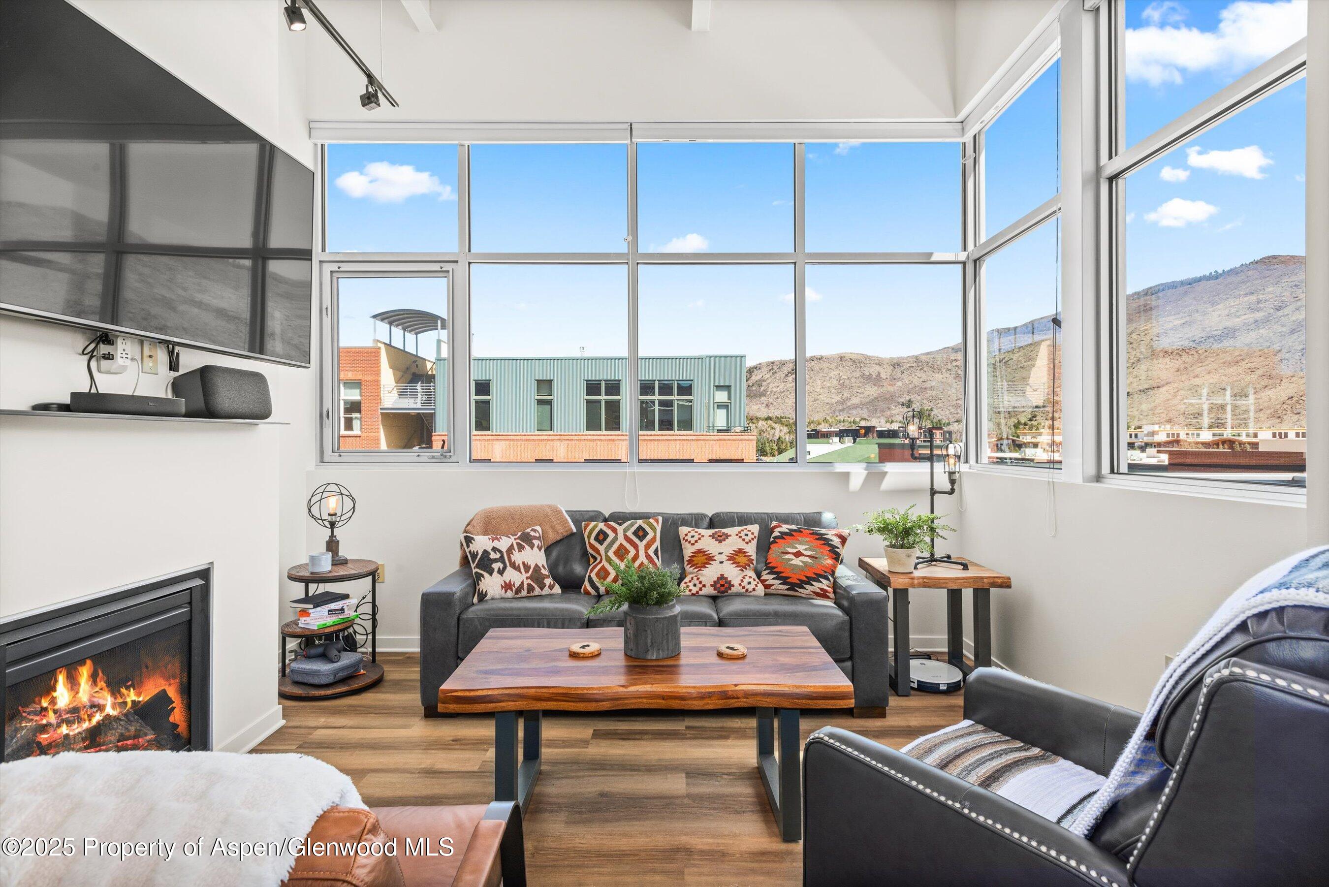361 Robinson Street, Unit 314 Basalt, CO 81621 - Photo 6 of 17 a bedroom with furniture and a window