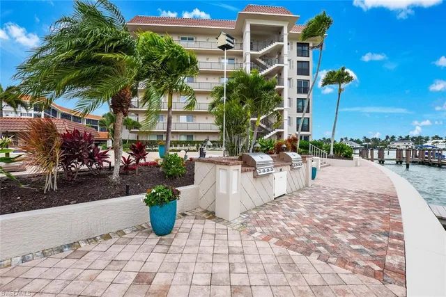 a view of multiple houses with a patio