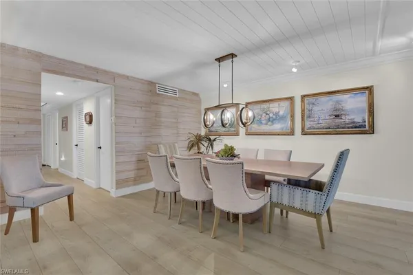 a view of a dining room with furniture