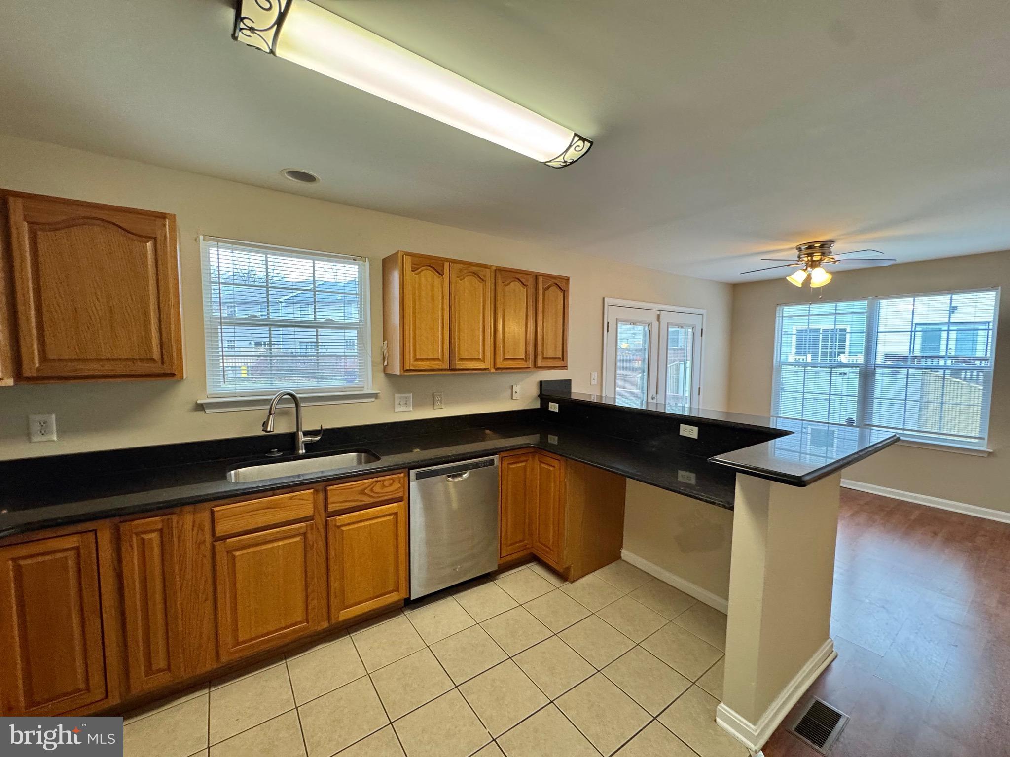 211 Langdon Farm Circle Odenton, MD 21113 - Photo 14 of 38 MAIN LEVEL KITCHEN BUILT-IN DESK