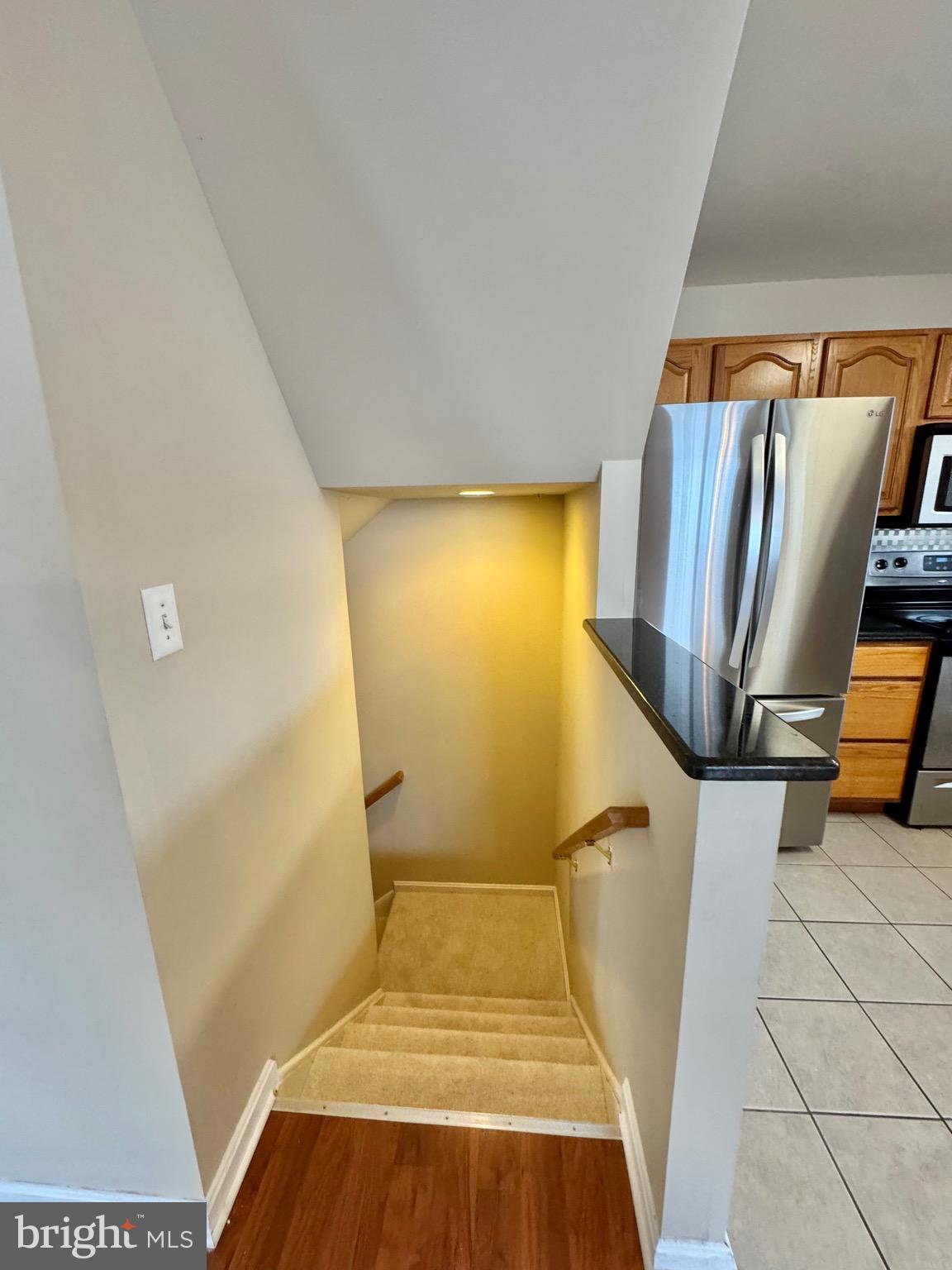 211 Langdon Farm Circle Odenton, MD 21113 - Photo 27 of 38 STAIRCASE TO LOWER LEVEL