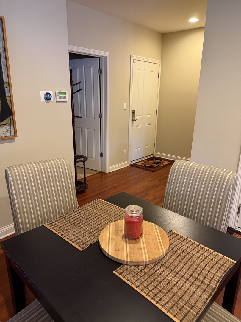 4546 North Spaulding Avenue, Unit 1 Chicago, IL 60625 - Photo 11 of 22 a bedroom with a bed and wooden floor