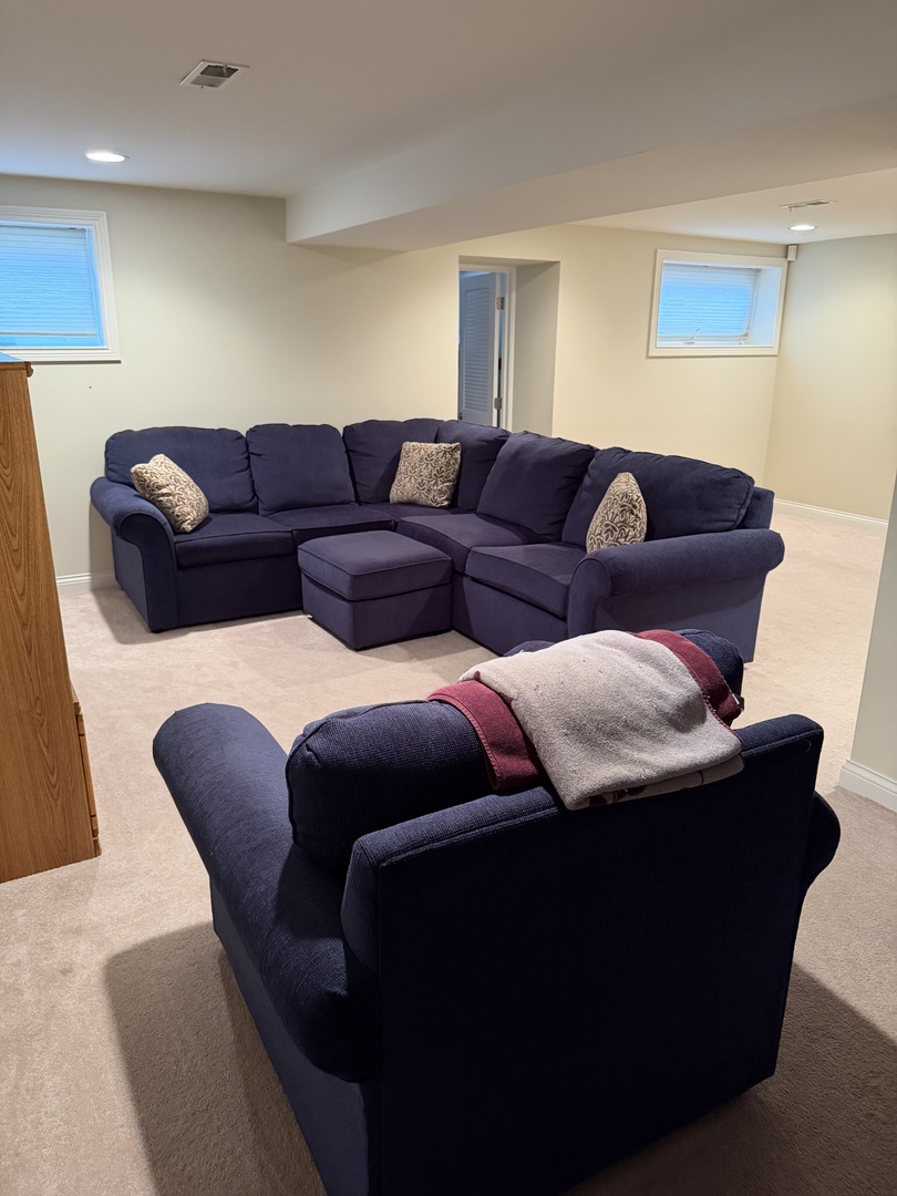 4546 North Spaulding Avenue, Unit 1 Chicago, IL 60625 - Photo 17 of 22 a living room with furniture and a couch