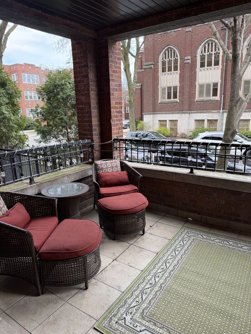 4546 North Spaulding Avenue, Unit 1 Chicago, IL 60625 - Photo 2 of 22 a view of a chairs and table in th patio