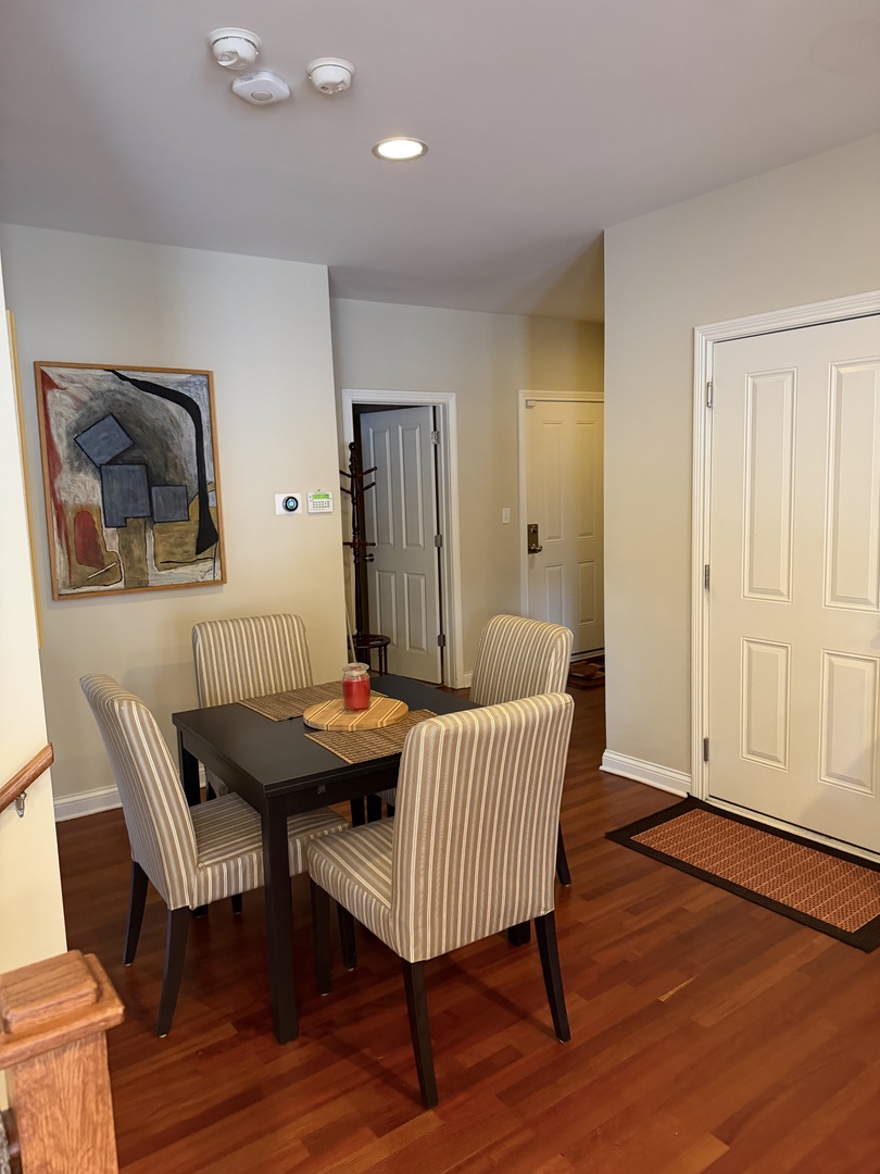 4546 North Spaulding Avenue, Unit 1 Chicago, IL 60625 - Photo 8 of 22 a room with furniture and wooden floor
