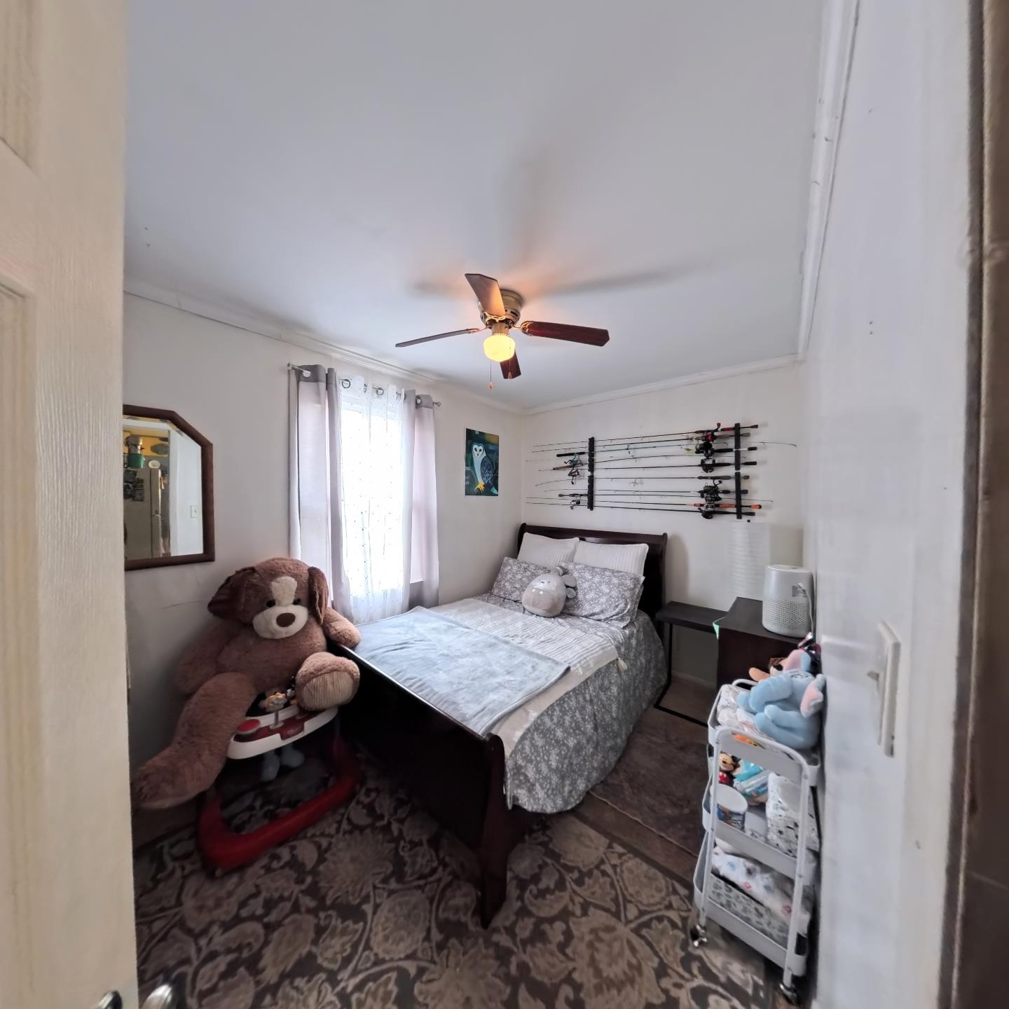 1209 Watson Street Streator, IL 61364 - Photo 12 of 15 a bedroom that has a bed and a chandelier