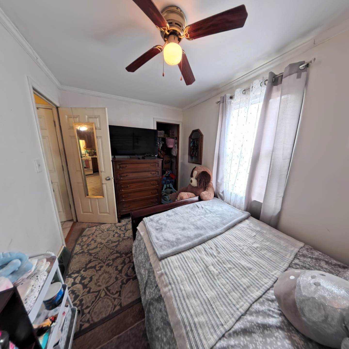 1209 Watson Street Streator, IL 61364 - Photo 13 of 15 a bedroom with a bed and a chandelier