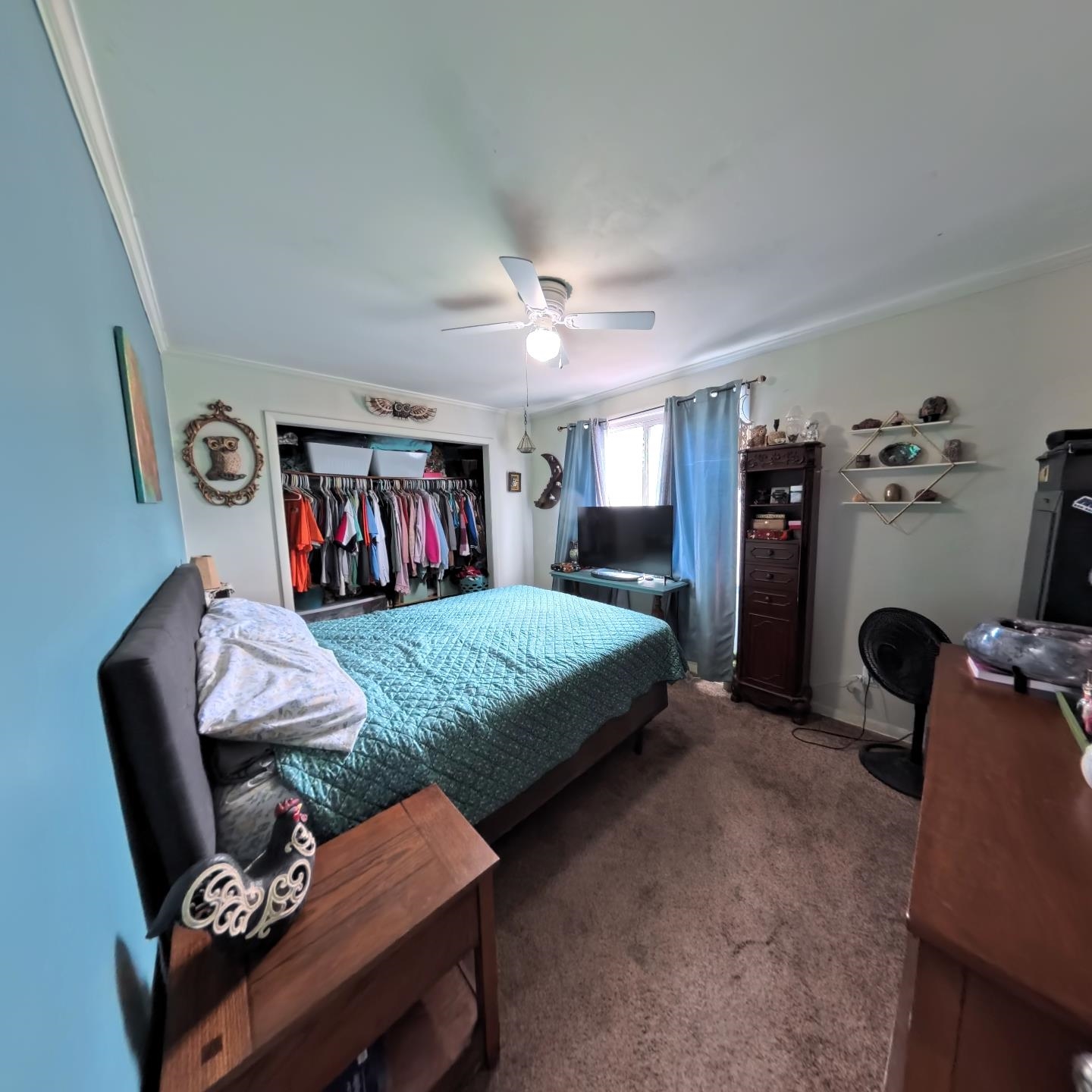 1209 Watson Street Streator, IL 61364 - Photo 10 of 15 a bedroom with a bed and a chandelier