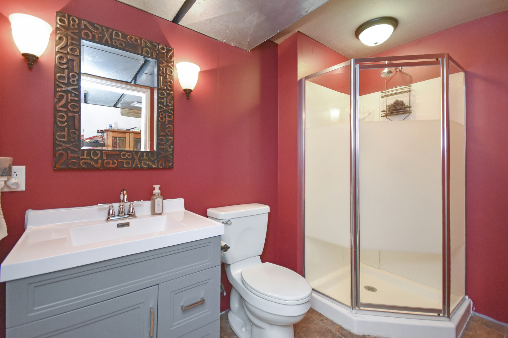 604 Morningside Drive Chenoa, IL 61726 - Photo 23 of 33 a bathroom with a sink mirror vanity and toilet