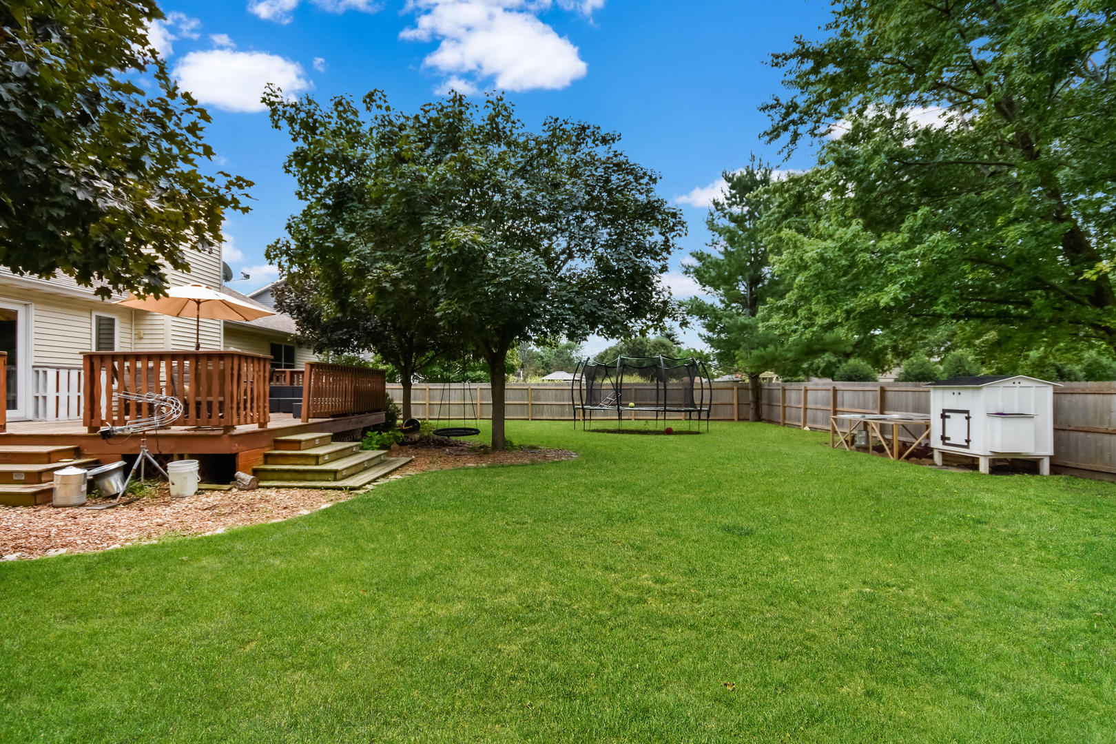 604 Morningside Drive Chenoa, IL 61726 - Photo 28 of 33 a view of a house with backyard and sitting area