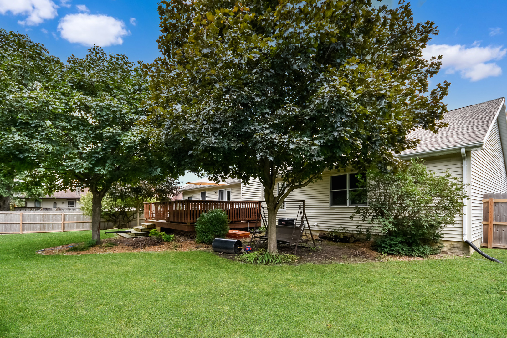 604 Morningside Drive Chenoa, IL 61726 - Photo 29 of 33 a view of a house with backyard sitting area and garden