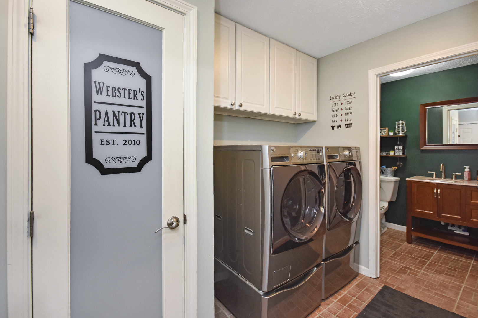 604 Morningside Drive Chenoa, IL 61726 - Photo 8 of 33 a view of a kitchen with washer and dryer