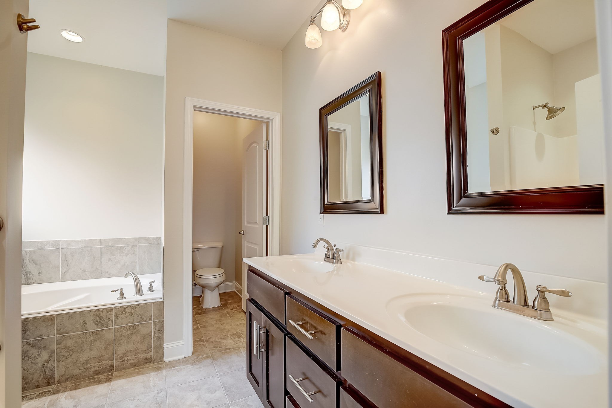 1028 Grace Road Pleasant View, TN 37015 - Photo 14 of 21 a bathroom with a sink and a mirror