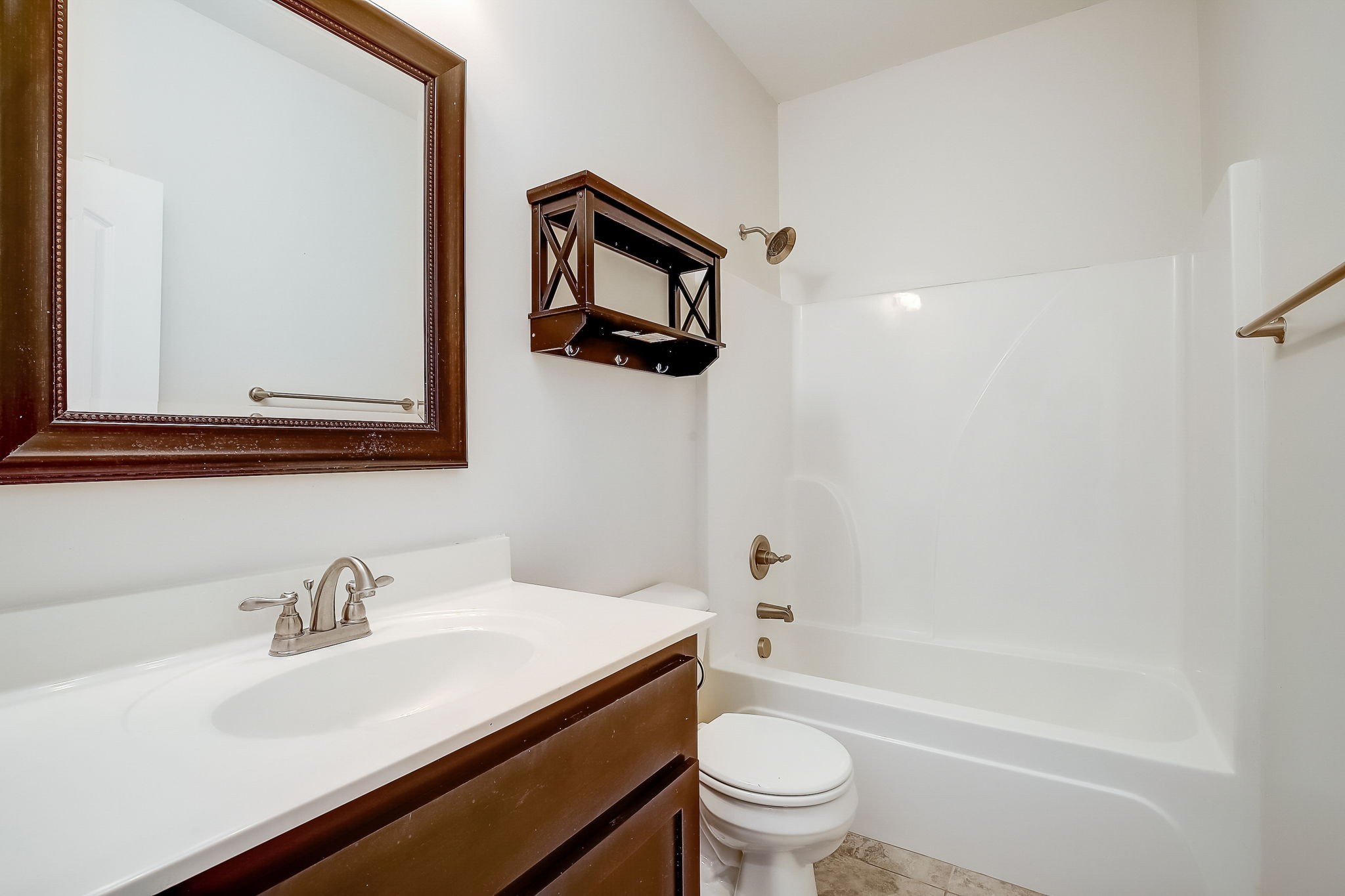 1028 Grace Road Pleasant View, TN 37015 - Photo 17 of 21 a bathroom with a sink a toilet and a bathtub