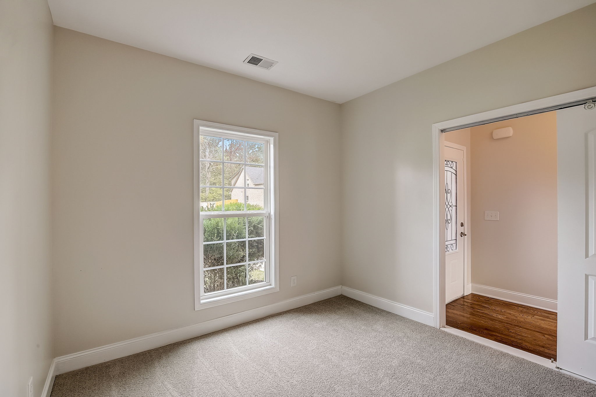 1028 Grace Road Pleasant View, TN 37015 - Photo 10 of 21 an empty room with windows